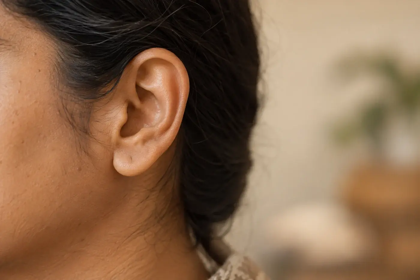 Illustrative close-up of an ear in profile
